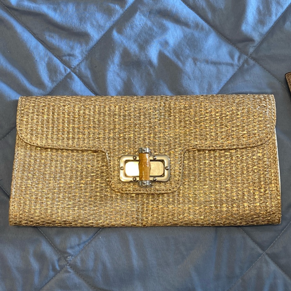 Metallic clutch bag